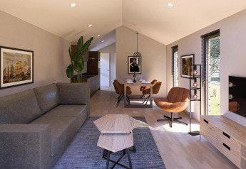 Moderne woonkamer in Beach House Zuid bij EuroParcs Enkhuizer Strand, stijlvol ingericht en comfortabel gemeubileerd.