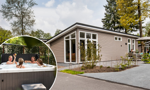 Rialto Wellness Lodge met eigentijdse uitstraling, terras en gasten in de jacuzzi in een groene omgeving.