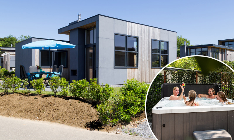 Lodge Z Module Wellness moderne à Résidence Valkenburg, Pays-Bas, avec terrasse et famille dans un jacuzzi.