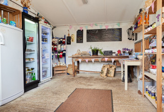 Cozy farm shop at Feather Down East Shilvinghampton holiday park with local produce and fresh eggs.