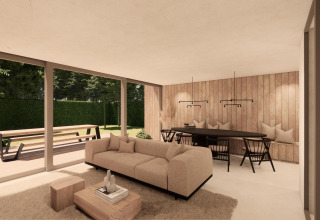 Sala moderna de Group Lodge en Woodz Lodges, Bélgica, con grandes ventanales y vista al jardín.
