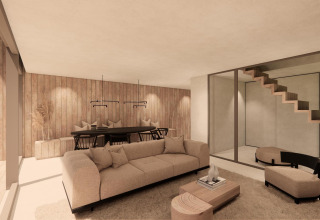 Soggiorno e sala da pranzo moderni al Group Lodge presso Woodz Lodges in Belgio con finiture in legno chiaro.