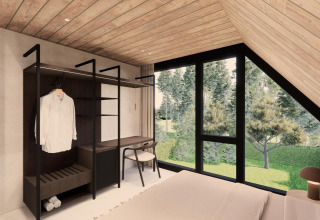 Dormitorio moderno en Group Lodge en Woodz Lodges, Bélgica, con ventana panorámica y vista al bosque.