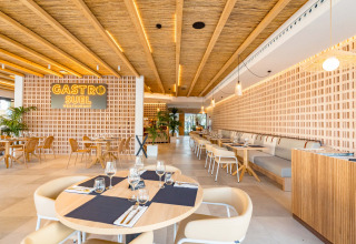 Bright interior of Gastro Suel restaurant at Camping Costa del Sol Glamping Village, Andalusia, Spain.