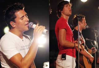 Three male singers perform on stage with microphones at Camping Bella Italia holiday park in Veneto, Italy.