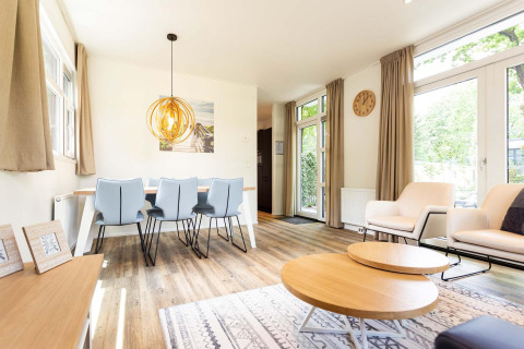 Bright, modern living and dining area at Special Wellness Module (Spa), Holiday Park Gelloo, Netherlands.