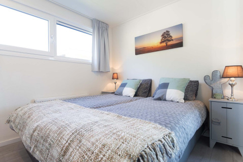 Dormitorio moderno y acogedor en Collosseo Wellness (Spa) en Résidence Valkenburg, Países Bajos.
