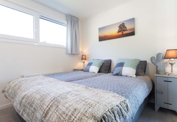 Dormitorio moderno y acogedor en Collosseo Wellness (Spa) en Résidence Valkenburg, Países Bajos.