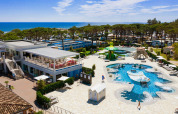 Camping Village Cavallino holiday park in Veneto, Italy with pool, restaurant, and sea view.