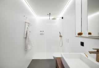 Modern, minimalist bathroom in the tiny house Unbrick One | Sauna at Brinckerduyn, Netherlands.