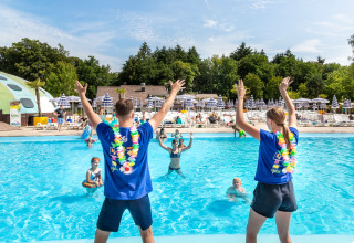 Two instructors lead water aerobics in the pool at hu Birkelt Village holiday park in Mersch, Luxembourg.