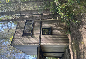 Modern cabin called Comfort Sweet Wellness at Cosy Cabins, nestled in the Limburg forest in Belgium.