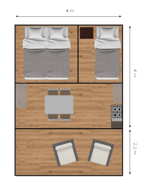Floor plan of a glamping accommodation showing two bedrooms, dining area, kitchen, and lounge area.