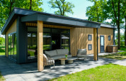 Udendørsbillede af Wood Cottage med moderne design og terrasse, Holiday park De Witte Berg, Holland.