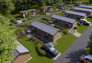 Luchtbeeld van Doornenburg Lodge in Veluwepark de Bosgraaf, Nederland, met lodges en groengebieden rondom.