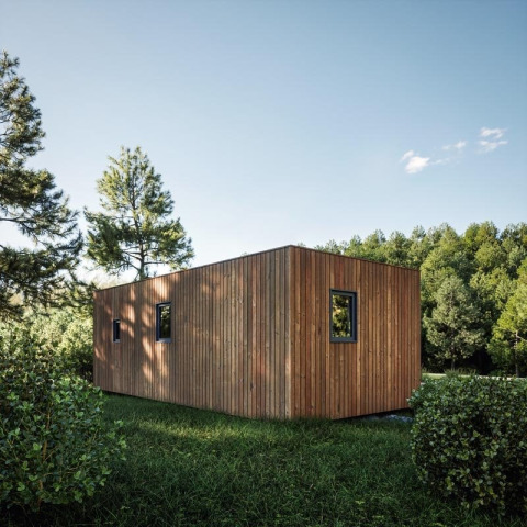 Cabaña moderna de madera con líneas sencillas en el parque vacacional Hameau de l'Ourthe, Bélgica.