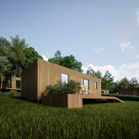 Moderne houten woning met terras in groene omgeving bij Hameau de l'Ourthe vakantiepark, Belgisch Luxemburg.