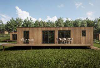 Cabaña vacacional de madera moderna con terraza, rodeada de naturaleza en Hameau de l'Ourthe, Bélgica.