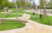 Children playing on an adventure playground obstacle course at De Leistert holiday park in Limburg, Netherlands.