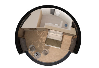 Vista dall’alto della tiny house Lumni Pod a Wilsumer Berge, Germania, che mostra il layout compatto.