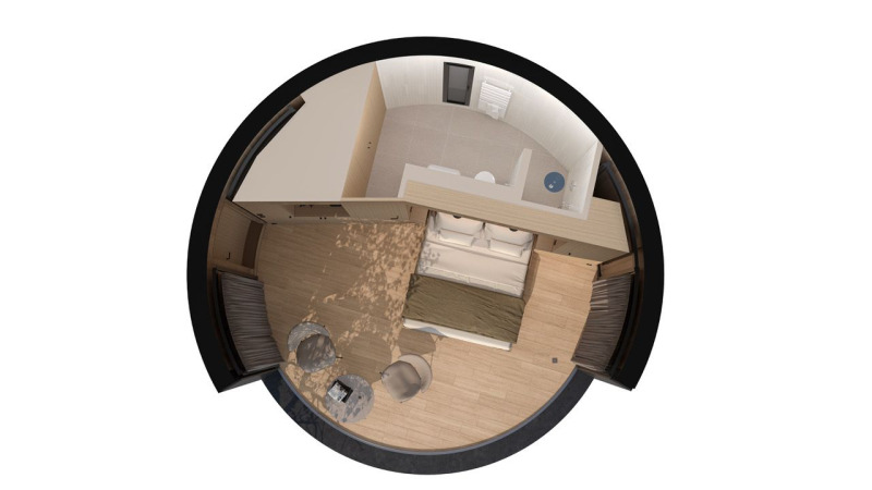 Fugleperspektiv af Lumni Pod tiny house på Wilsumer Berge, Tyskland, viser kompakt planløsning.