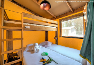 Interior view of Ecolodge Cotton Toilée COMFORT safari tent at Flower Camping Le Conleau in France.