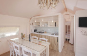 Interior of a Glamping Superior Safari Tent at Valamar Camping Lanterna in Croatia, bright and modern design.