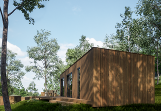 Eco Lodge en Hameau de l'Ourthe, Bélgica, rodeado de árboles frondosos y un entorno natural tranquilo.