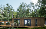 Moderne houten lodge bij Eco Lodge in Hameau de l'Ourthe, België, omgeven door bomen en natuur.