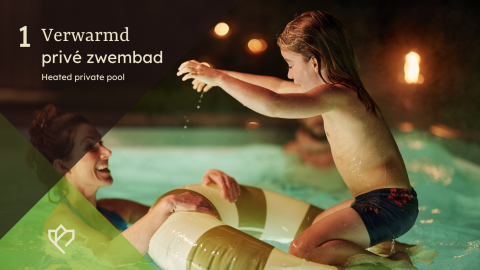 Mother and child enjoying a heated private pool at night at a lodge, surrounded by soft ambient lights.