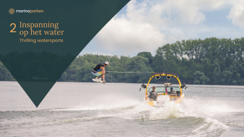 Glampinggasten beleven avontuurlijke watersporten en wakeboarden achter een boot op een Vlaamse vijver.