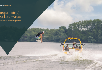 Glamping guests enjoy thrilling watersports, wakeboarding behind a yellow speedboat on a scenic lake.