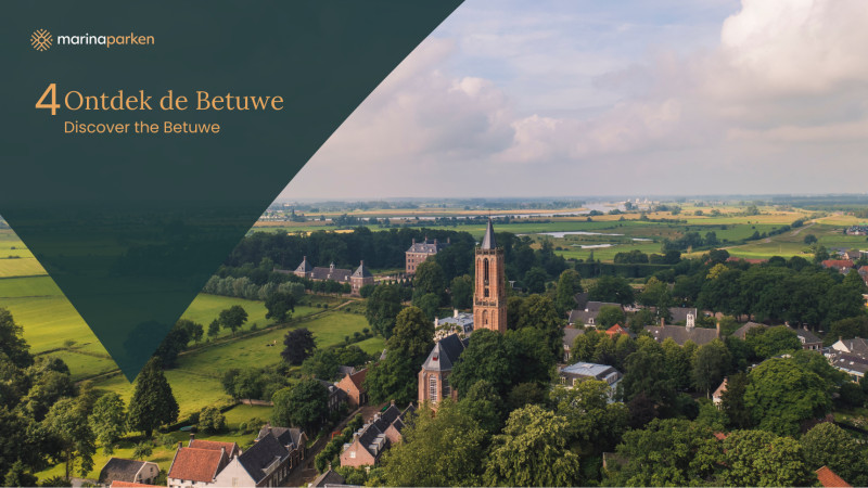 Aerial view of Betuwe village with a church and fields, taken from a glamping accommodation in Holland.