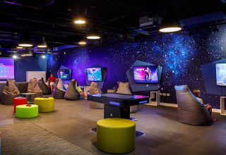 Gaming lounge with bean bags and large screens at Valamar Camping Istra holiday park in Istria, Croatia.