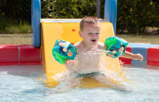 Child in paddling pool outside - Noetselerberg - Nijverdal, Overijssel, Netherlands