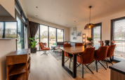 Bright, modern living and dining area at Cube Split Hottub, EuroParcs Enkhuizer Strand, The Netherlands.