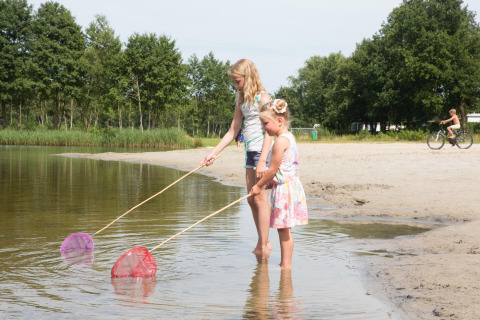 Girls fishing in lake - Camping _t Veld - Rheeze, Overijssel, Netherlands