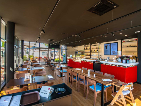 Bright, modern restaurant at Camping Arena Grand Kažela holiday park in Istria, Croatia, with wood decor.