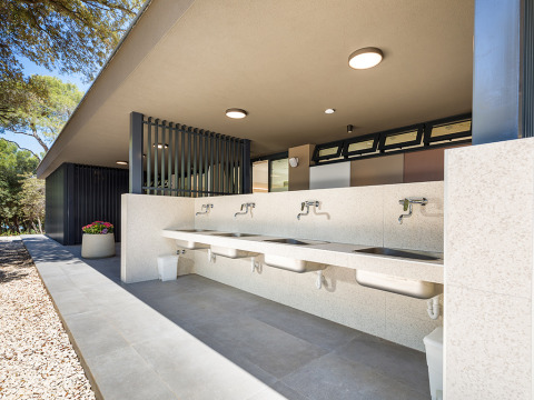 Outdoor sink area with modern design at Camping Arena Stoja, Istria, Croatia, surrounded by natural scenery.