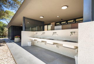 Outdoor sink area with modern design at Camping Arena Stoja, Istria, Croatia, surrounded by natural scenery.