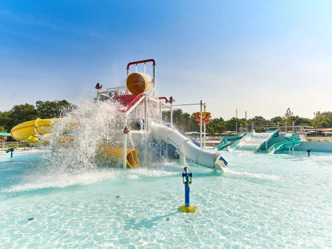 Water playground with slides and tipping bucket at Camping Park Umag, a holiday park in Istria, Croatia.