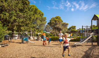 Children enjoying the playground at Valamar Camping Padova holiday park in Primorje-Gorski Kotar, Croatia.
