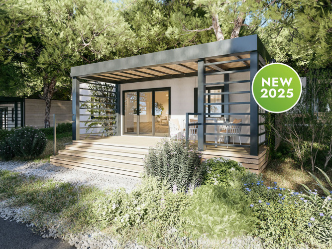 Moderne Camping Home Sea View lodge met houten terras en veel groen, nieuw voor 2025.