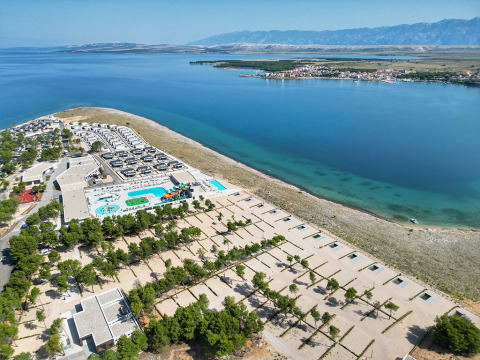 Aerial view of Aminess Style Camping Avalona Resort by the coast, featuring pools and sea views in Zadar, Croatia.