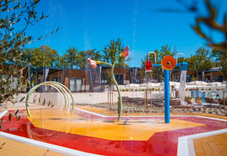 Colorful splash pad at Aminess Style Camping Atea Resort, Primorje-Gorski Kotar County, Croatia on a sunny day.
