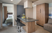 Modern kitchen and lounge area in Amber Luxury Holiday Home at Aminess Style Camping Atea Resort, Croatia.