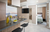 Modern living and kitchen area at Amber Luxury Holiday Home in Aminess Style Camping Atea Resort, Croatia.