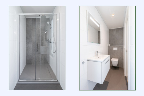 Bagno moderno con box doccia e wc sospeso in un lodge al Hofparken Wiltershaar, Paesi Bassi.