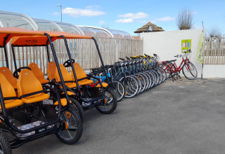 Bike and family quadricycle rental at Flower Camping Le Pré des Sables in Pays de la Loire, France.