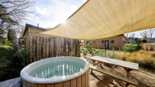 Hottub bij zandlodge - Vakantiepark de IJsvogel - Voorthuizen, Gelderland, Nederland